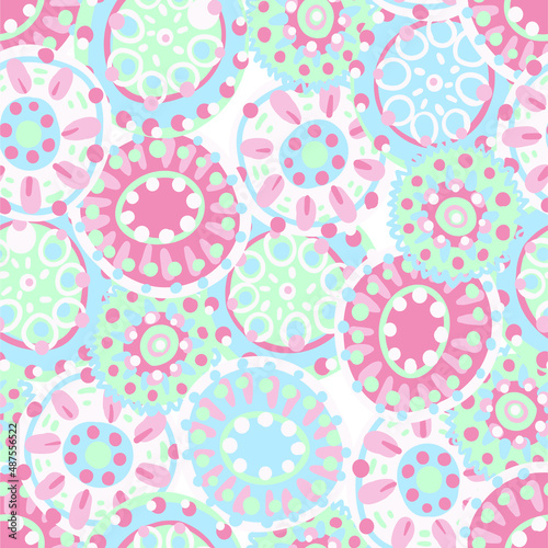 Original vector seamless pattern with doodle circles in the ethnic style of India, Persia and other Arab and Eastern countries. Variegated and multi-colored ornament for printing on fabrics