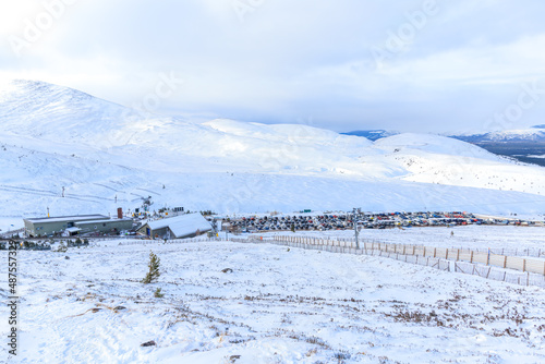 A Scenic view of a ski resort in the Scottish mountain during winter with snow 