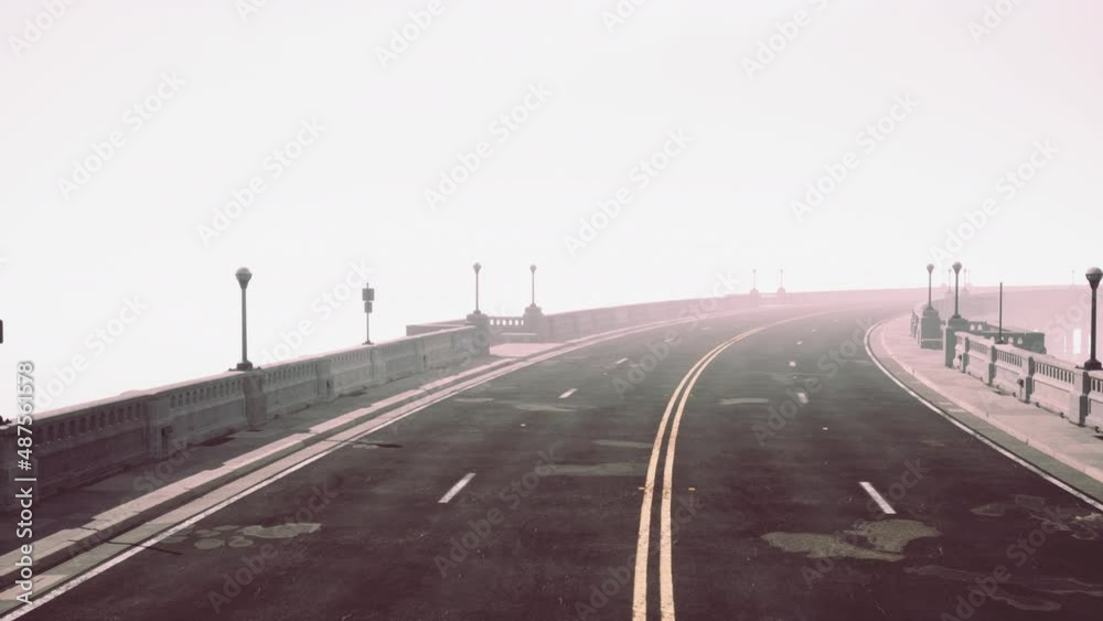 Old empty stone bridge on a foggy day Old empty stone bridge on a foggy day