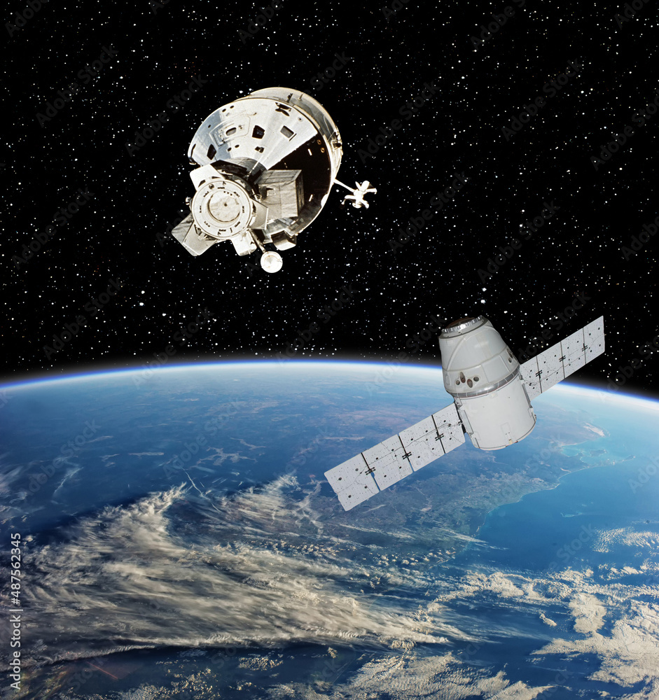 Fototapeta premium Earth and spacecrafts. Outer space. The elements of this image furnished by NASA.