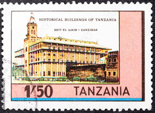 TANZANIA - CIRCA 1983: A stamp printed in Tanzania shows historical building of Tanzania - Biet el Ajaib in Zanzibar, series, circa 1983 photo