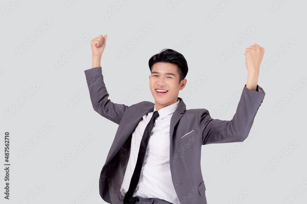 Portrait businessman in suit standing with win success isolated on white background, young asian business man is manager or executive having confident and excited is positive, expression and emotion. Portrait businessman in suit standing with win success isolated on white background, young asian business man is manager or executive having confident and excited is positive, expression and emotion.