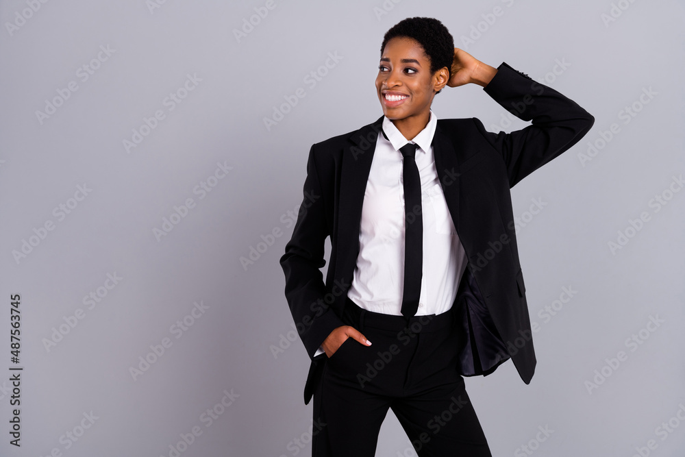Photo of young cheerful girl guy hand touch hand sexy look empty space isolated over grey color background Photo of young cheerful girl guy hand touch hand sexy look empty space isolated over grey color background