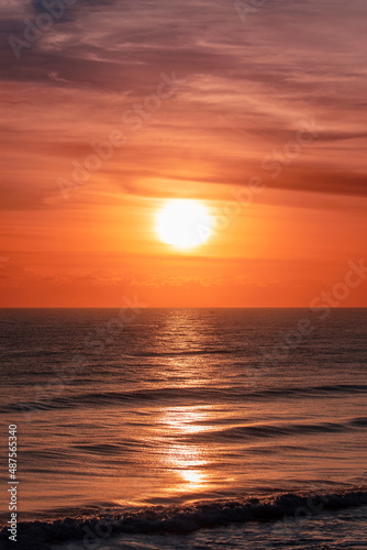 Orange lit sunrise skies over ocean. Gold Coast, Australia © Bostock