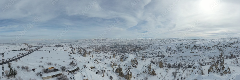 Pigeon Valley and Cave town in Goreme during winter time. Cappadocia, Turkey. Open air museum, Goreme national park. Heavenly landscape