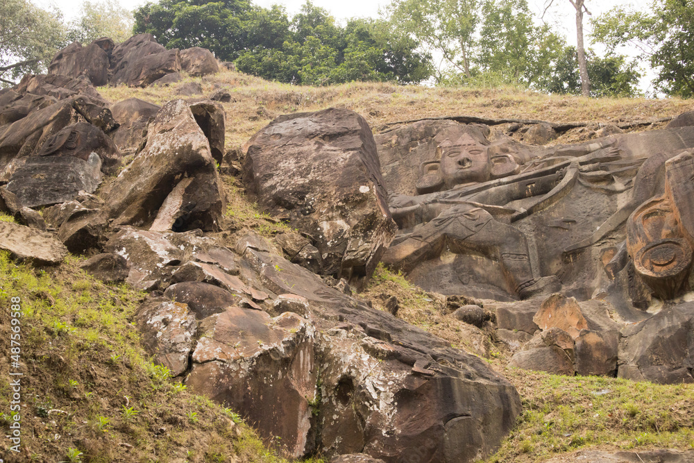 Unakoti, India - January 23 2022: Famous Rock sculpture of Unakoti. Unakoti, India - January 23 2022: Famous Rock sculpture of Unakoti.