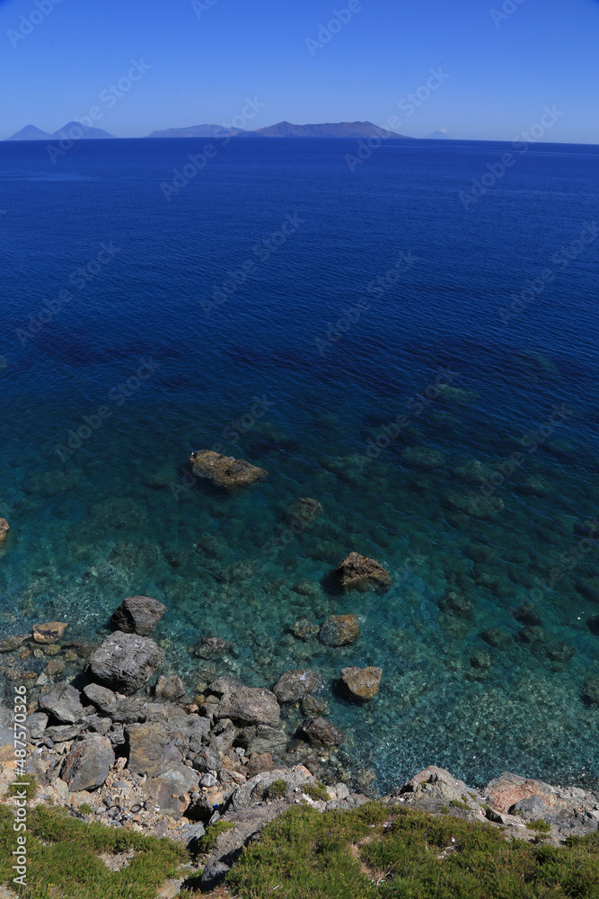 View of the underwater bed from above with crystal water with horizon over the sea