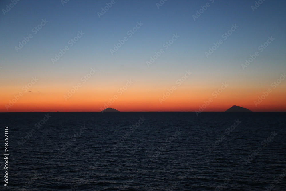Sunset over the Mediterranean sea with clear sky. Sun over the water