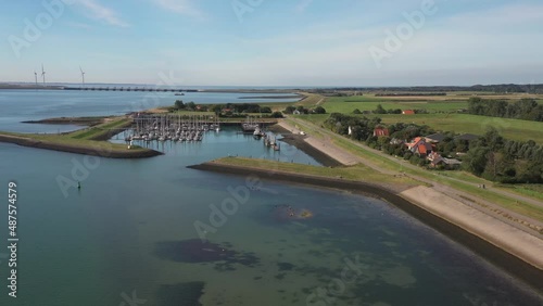 Aerial shot of a marina on the Dutch coast on a sunny day photo