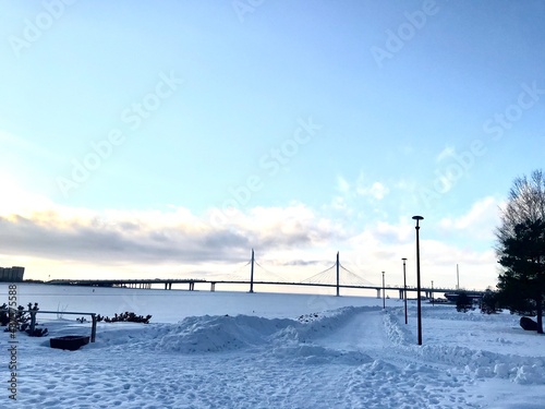 Winter landscape with a bridge