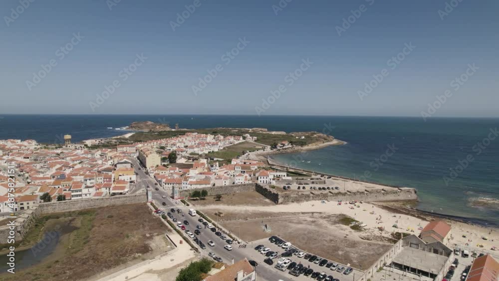 Drone flying over Peniche coastal village in Portugal. Aerial forward Drone flying over Peniche coastal village in Portugal. Aerial forward