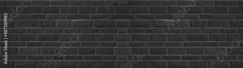 Black anthracite gray grey brick tiles wall texture wide background banner pa...