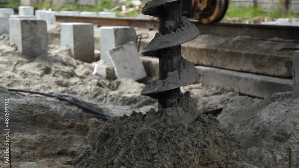 Machine for soil drilling for installing concrete piles, soil drilling during the construction of multi-storey houses Machine for soil drilling for installing concrete piles, soil drilling during the construction of multi-storey houses