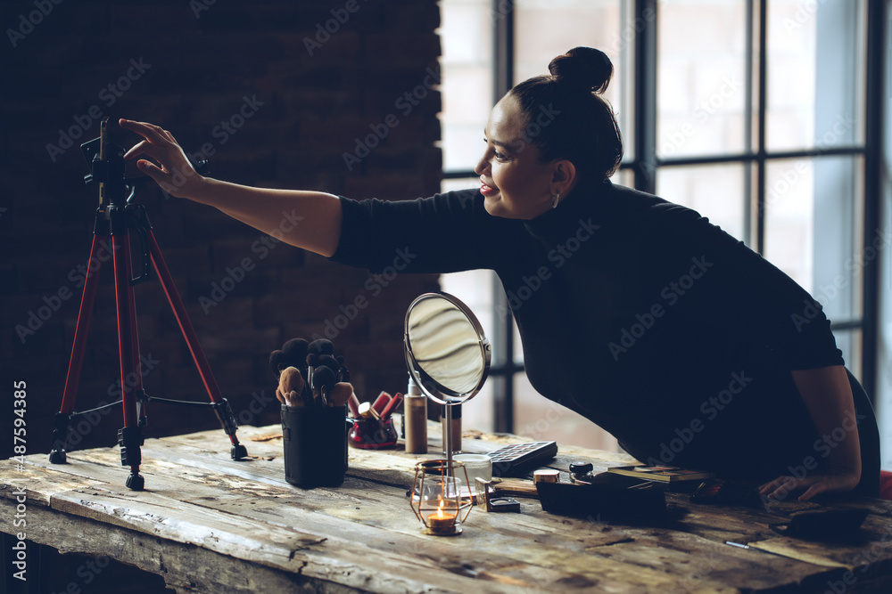 A woman does makeup live. High quality photo A woman does makeup live. High quality photo