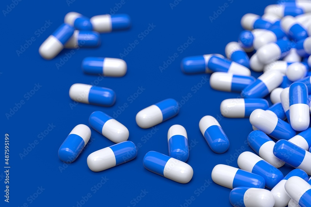 blue and white pharmaceuticals capsules 3D computer generated isolated on blue background blue and white pharmaceuticals capsules 3D computer generated isolated on blue background