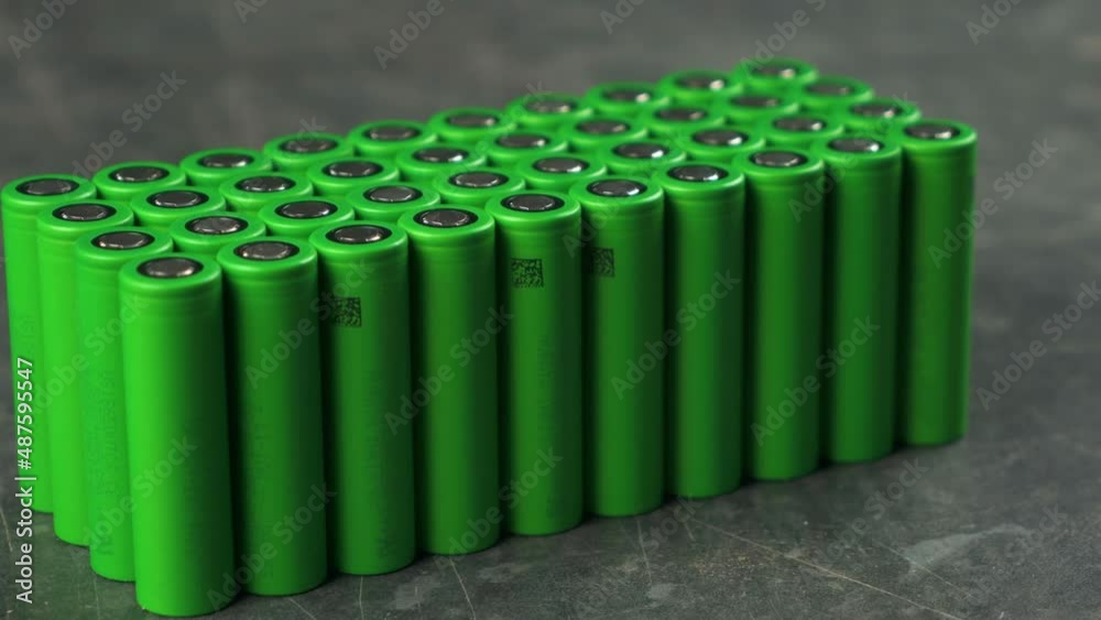 18650 and 21700 cell battery 64 batteries lined up in a group wide from the side
