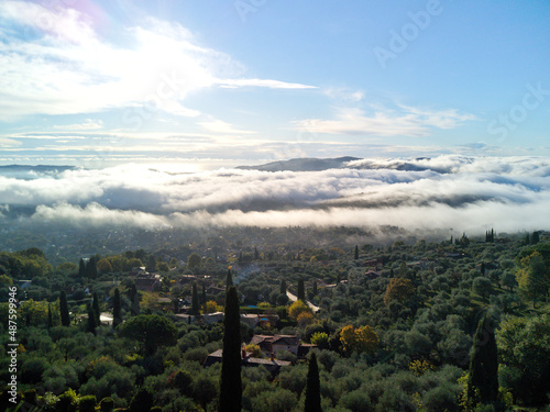 French morning with sea of clouds down the hill photo