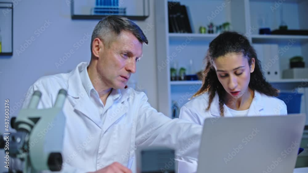 Experienced doctor and intern planning disease treatment for patient, medicine Experienced doctor and intern planning disease treatment for patient, medicine