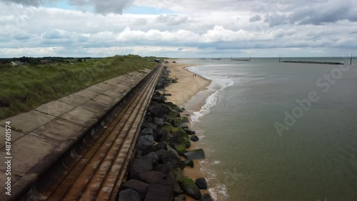 Wallpaper Mural Leading line of the ocean dykes . Aerial drone view of the ocean beach with the flood control embarkment. Torontodigital.ca