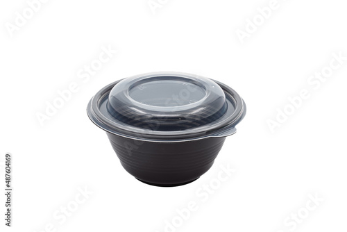 Plastic, black, round bowl for eating on a white background