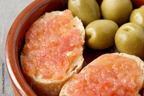 Bread with tomato (Pa amb tomaquet). Typical Catalan sandwich with grated tomato with olive oil. photo