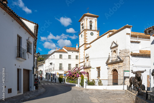 One of the central squares in the White Village of Grazalema, Spain, with the bronze bull statue honoring the Running of the Bulls in view.