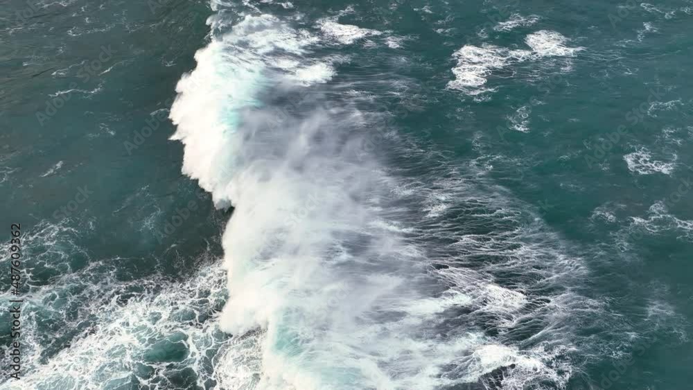 Slow motion drone video of ocean waves crashing the shore. Atlantic ocean Slow motion drone video of ocean waves crashing the shore. Atlantic ocean
