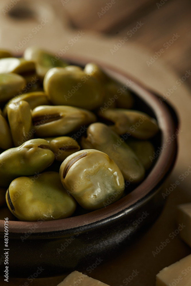 Broad beans with cheese, traditional Ecuadorian appetizer served in a typical deep dish with a traditional and culinary background
Broad beans with cheese, traditional Ecuadorian appetizer served in a typical deep dish with a traditional and culinary background