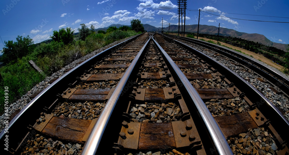Railroad Tracks Leading into the Horizon Rails Iron Transportation Railroad Tracks Leading into the Horizon Rails Iron Transportation