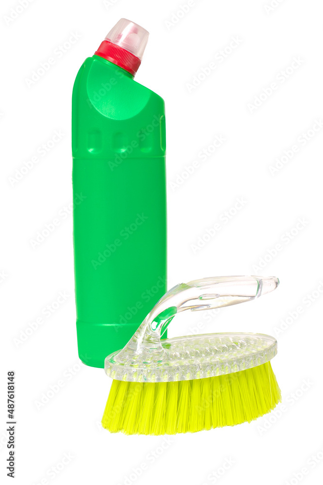 Plastic bottle of cleaning product and brush. Isolated on white background