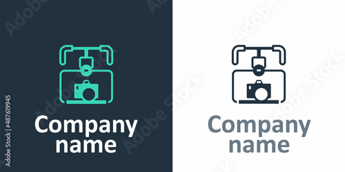 Logotype Gimbal stabilizer with DSLR camera icon isolated on white background. Logo design template element. Vector
