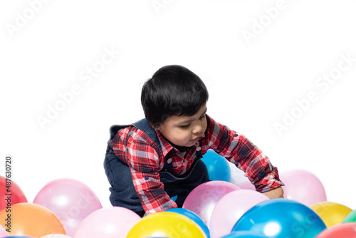 Happy Asian Indian Toddler Boy Playing With Balloons. Fun, Activity, Pre School, Educational, Kindergarten, Birthday, Learning, Home Activity, School, Nursery, Daycare, Play, Physical Activity Concept