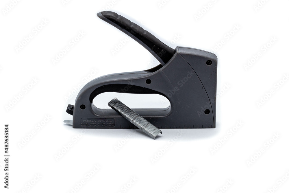 stapler with cartridges on a white background stapler with cartridges on a white background