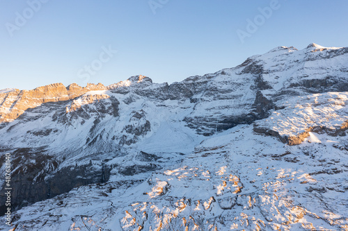 Amazing sunset in the alps of Switzerland. Wonderful flight with a drone over an amazing landscape in the canton of Uri and Glarus. Epic view over a street called Klausenpass.