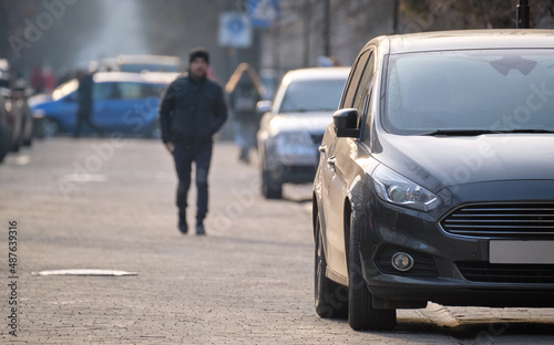 Wallpaper Mural Close up of a car parked illegally against traffic rules on pedestrian city street side Torontodigital.ca
