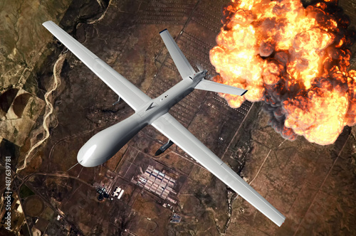 Air force plane performing mission to destroy enemy base. UAV dropping a bomb on a ground target. Big explosion. War. 3d rendering image. Elements of this image furnished by NASA