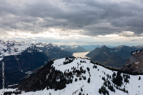 Amazing shot of a beautiful landscape in the alps of Switzerland. Wonderful flight with a drone over an amazing landscape in the canton of Schwyz. Epic view over a region called Mythenregion.