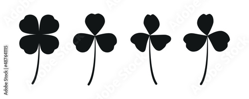 Silhouette black lucky clover leaf, trefoil, four leaves shamrock isolated on white, for St. Patrick's.
