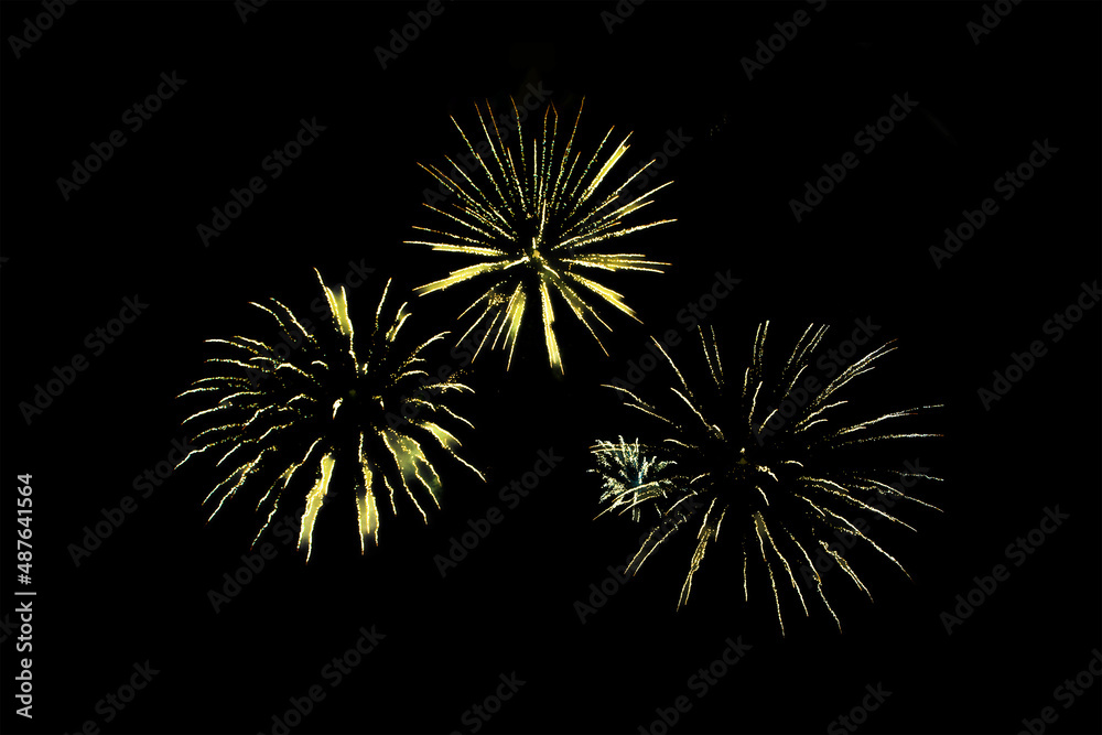 yellow fireworks. Bright festive fireworks for birthday, holiday or Christmas on a black background. Isolated yellow fireworks. Bright festive fireworks for birthday, holiday or Christmas on a black background. Isolated