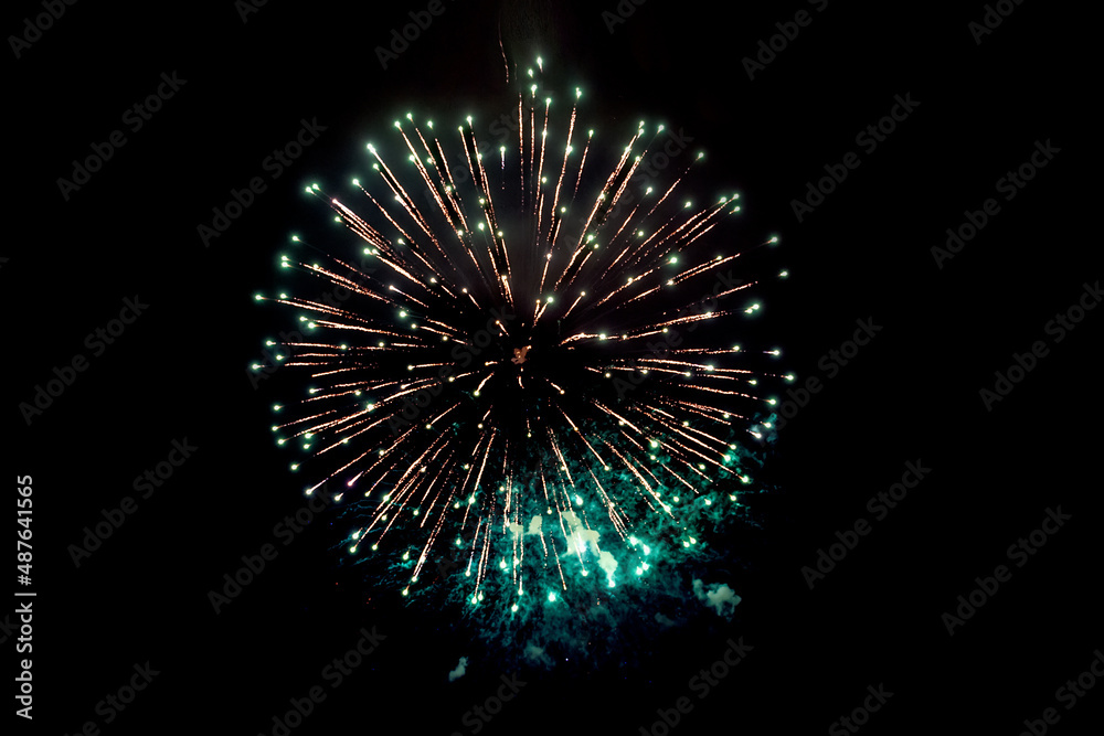 Sparks. Fireworks Are A Class Of Explosive Pyrotechnic Devices Used For Aesthetic Purposes. salute, on a black background. Festive Christmas lighting element for decoration. Isolated magic light Sparks. Fireworks Are A Class Of Explosive Pyrotechnic Devices Used For Aesthetic Purposes. salute, on a black background. Festive Christmas lighting element for decoration. Isolated magic light