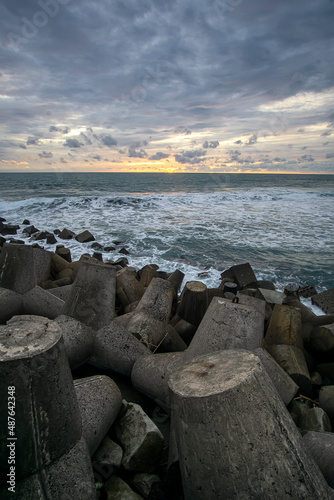 Rocks on the Glagah beach at sunset