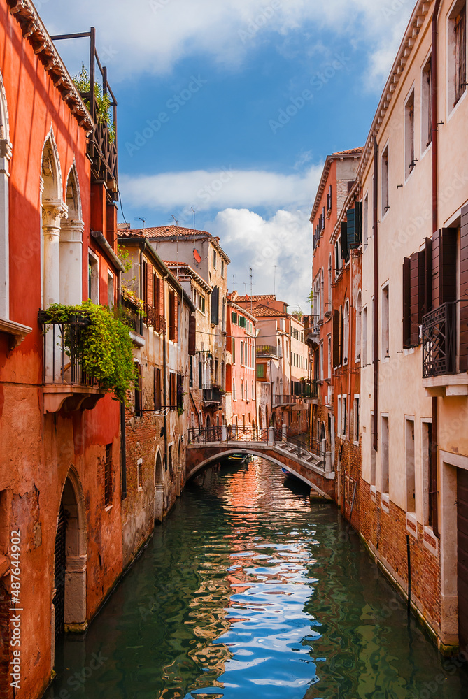 View of Rio della Toletta, a characteristic Venice canal with old traditional and colorful houses in the quiet Dorsoduro District