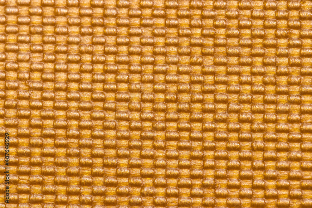 macro texture of yellow synthetic fabric macro texture of yellow synthetic fabric