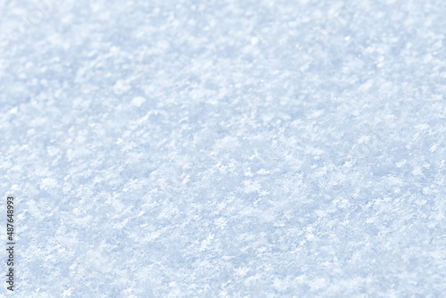 Snow from snowflakes, macro photo of white snow in winter, snow texture.