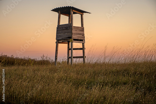 Hunting observation stand in Deliblato Sands, Serbia during sundown and early evening  photo