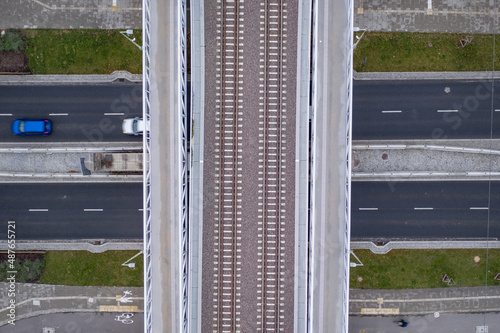 Railroad over Gorczewska Street in Wola district, Warsaw city, Poland, view from drone near Mlynow Station