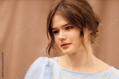 portrait of a girl in a blue dress