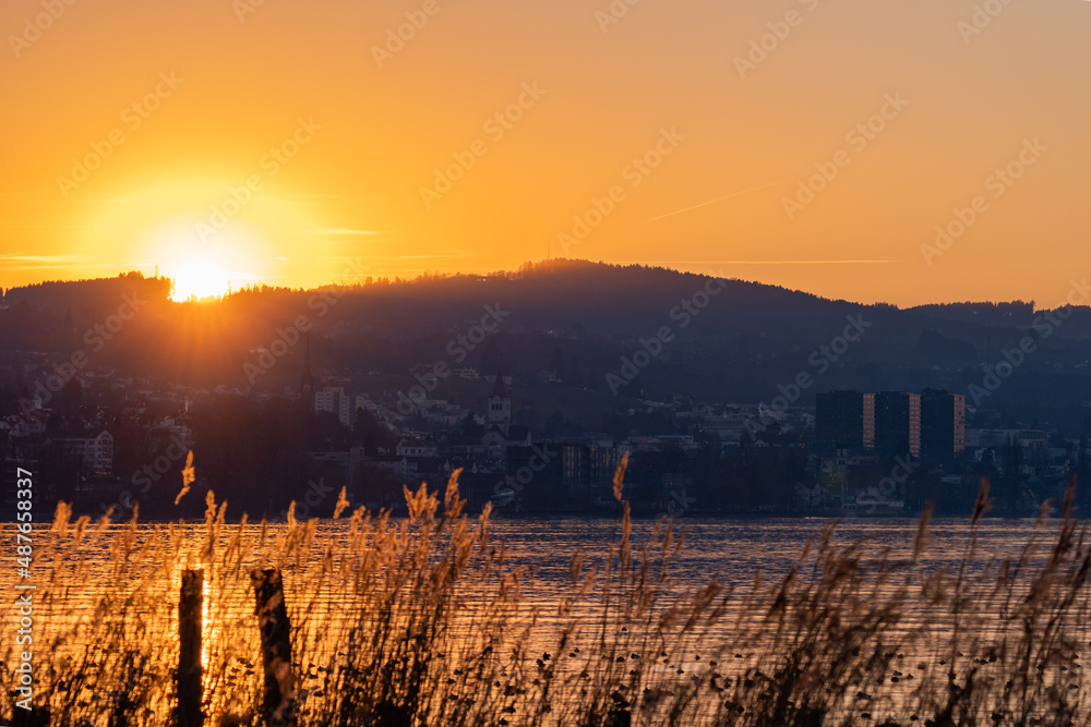 Fototapeta premium Sunset at the lake of Constance in Altenrhein in Switzerland