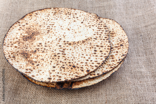 Matzah Shmurah. Jewish traditional Passover bread. Pesach celebration symbol. Closeup