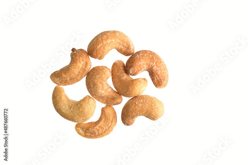 crunchy salted cashew nuts isolated on white background with clipping path